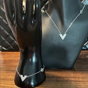 Dazzling Silver V-Pave Necklace and Bracelet Set